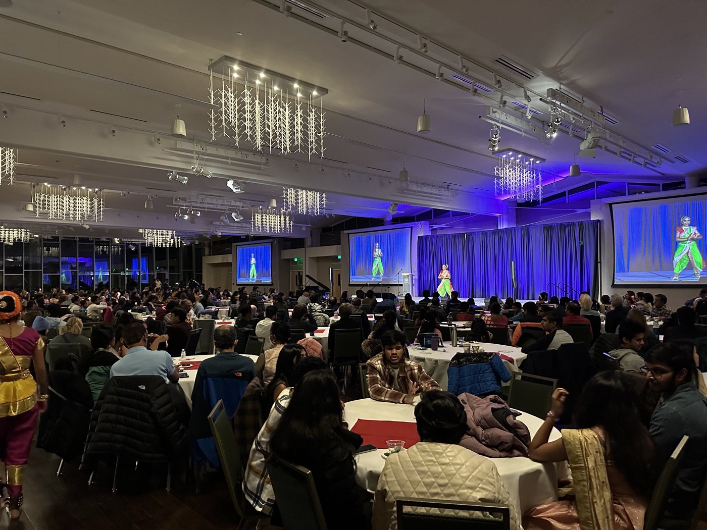 Packed ballroom at a community event
